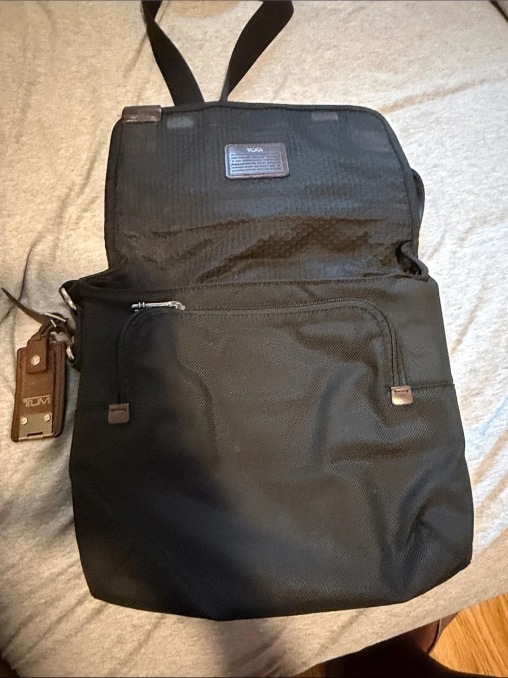 Tumi Black Messenger Bag with Brown Leather Trim